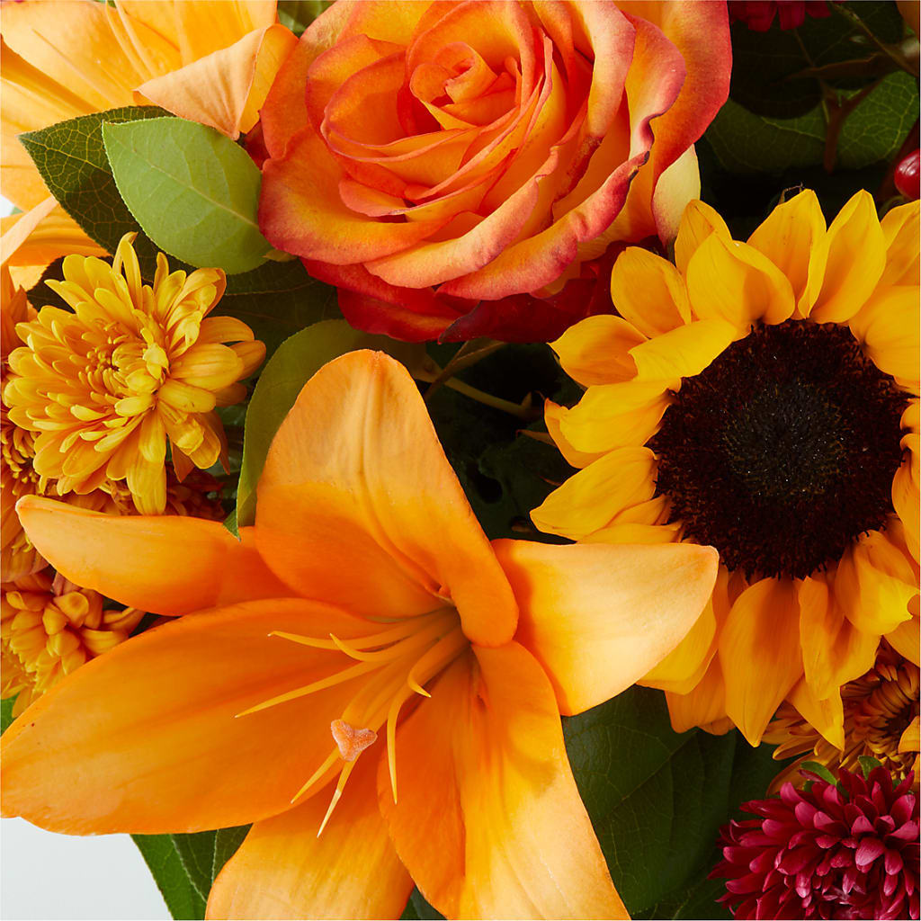 Grateful Centerpiece –  Pettles Flowers, Salina KS